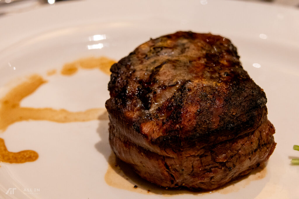 Steak on plate at Capital Grille for All In Technology and WatchGuard holiday luncheon
